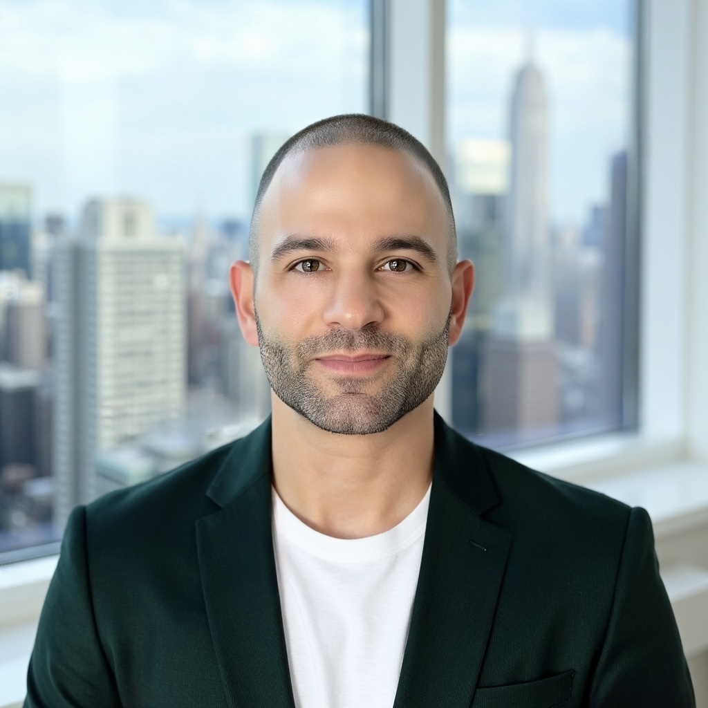 Jason Bratin in front of a New York City skyline